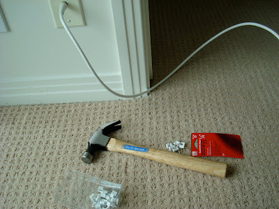 Hammer and supplies on carpet