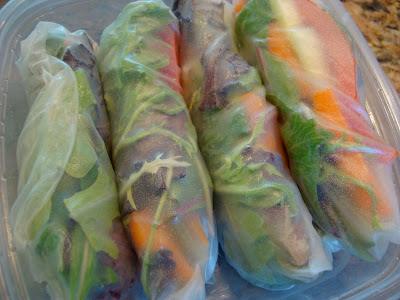 Close up of Spring Rolls in clear container