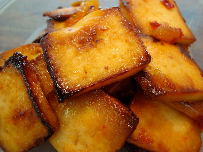 Sweet and Sour Honey Lemon Tofu chunks in container
