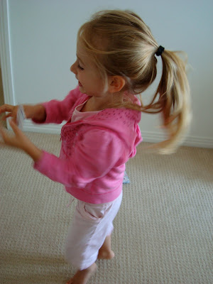 Side view of little girl standing in bedroom - 33