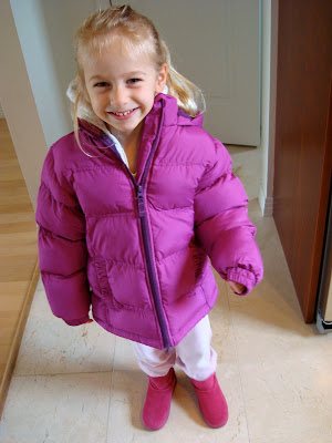 Young girl wearing new jacket and boots - 9