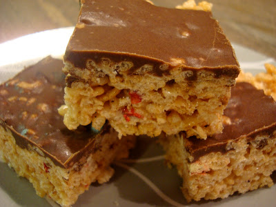 Three stacked GF Vegan "Rice Krispie" Treats with Chocolate Peanut Butter Coconut Oil Frosting