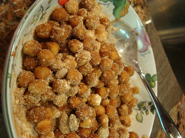 Chickpeas tossed up in dry ingredients