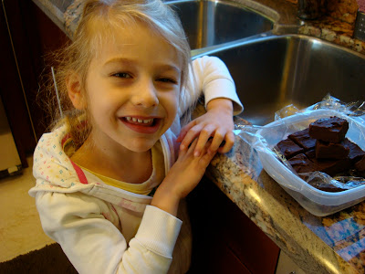 Chocolate Peanut Butter Fudge with young girl smiling