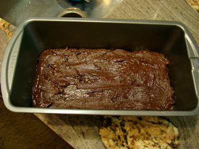 Mixed up ingredients spread into loaf pan