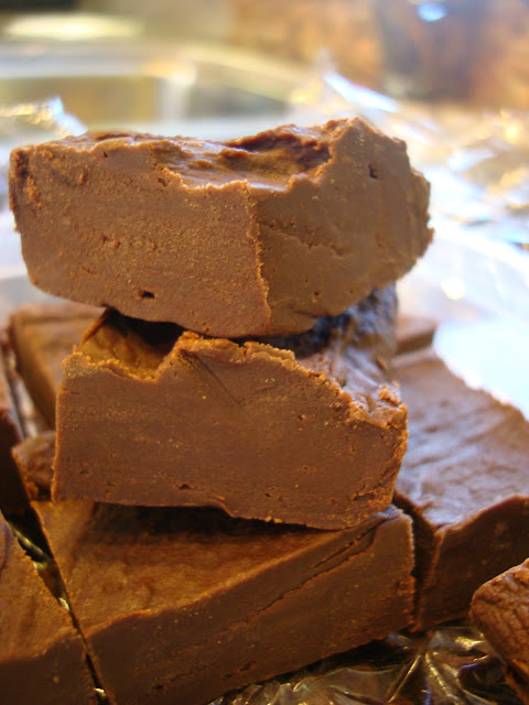 Chocolate Peanut Butter Fudge stacked on top of each other 