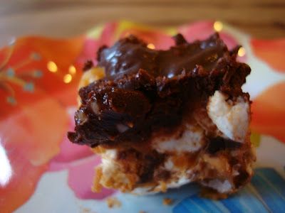 One cut GF Peanut Butter Marshmallow Bar with Vegan Chocolate Frosting