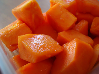 Diced up papaya in container