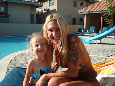 Woman and child sitting on lounge chair smiling - 9