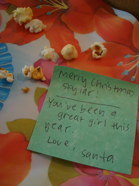 Remnants of Cinnamon & Sugar Popcorn and note from Santa