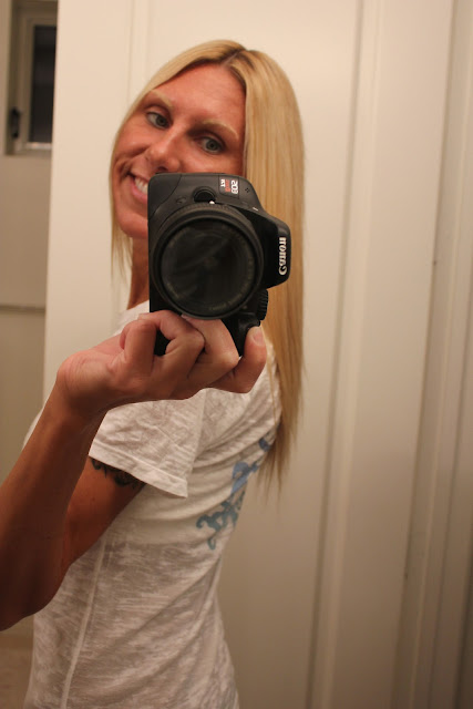 Woman taking picture showing new hair