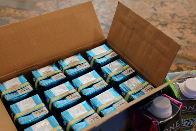 Overhead of open box of Coconut Water