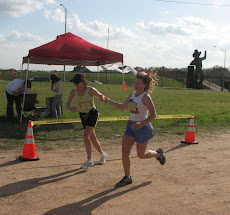 Marie Pekarik hands off to Liz Pittel at TIR
