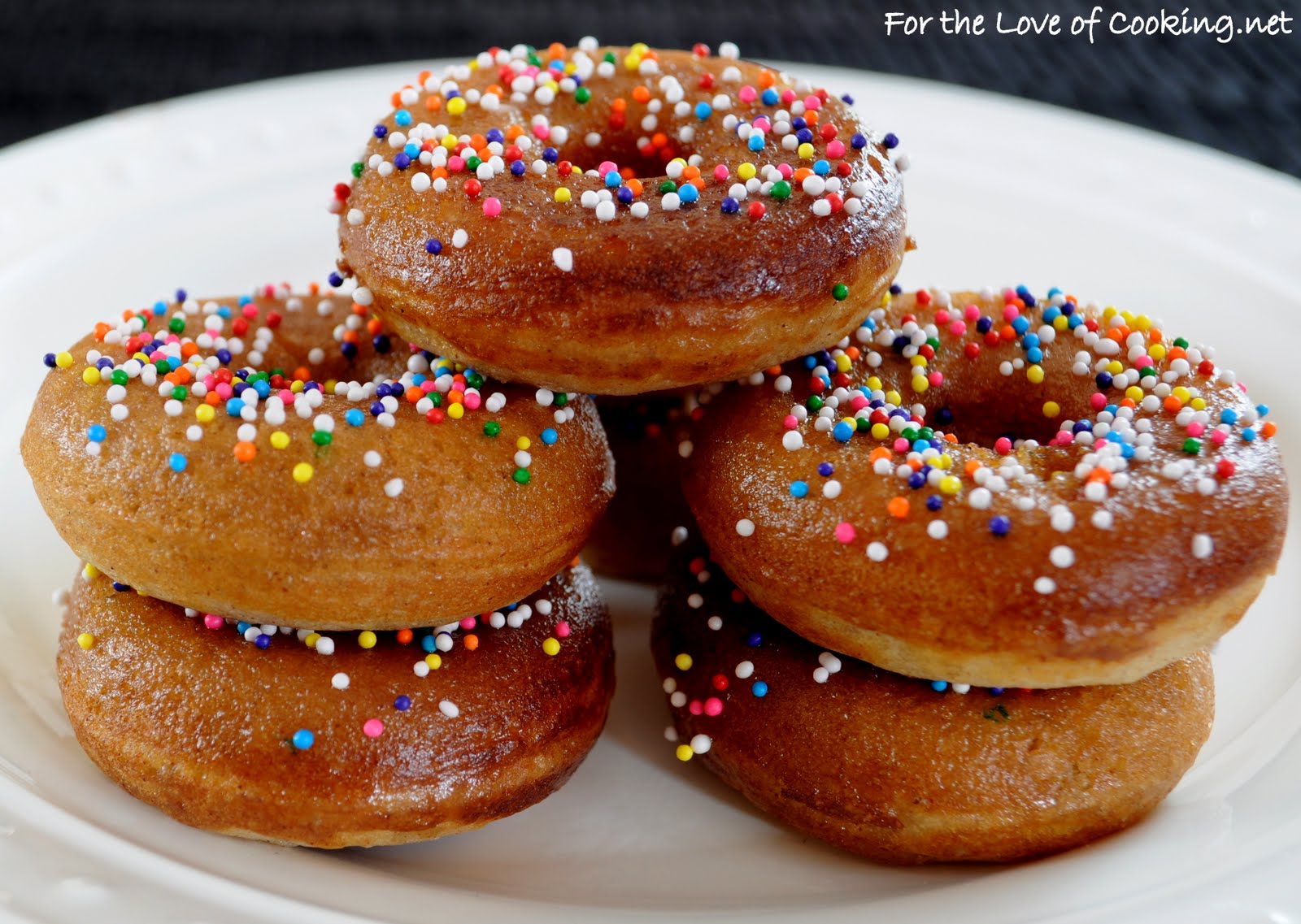 Homemade baked cinnamon mini donuts with maple glaze for the love of