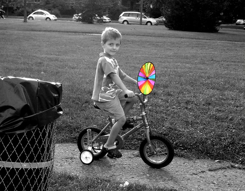 rainbow twirl, kid riding bike