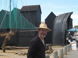 Mr A with Hastings boats and beach huts
