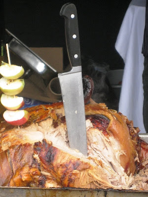 Roast pork with knife stuck in it