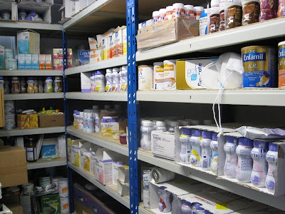 Bottles of nutritional supplements on shelves