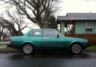 OLD PARKED CARS.: 1981 Toyota Corolla 2 door sedan.