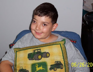 Michael with his John Deere pillow that mom had made for him a couple ...