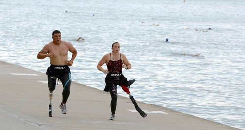 WWP's Chad Watson and Melissa Stockwell training for the 2009 Accenture ParaTriathlon Challenge in