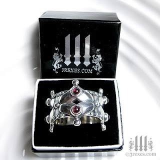 silver gothic wedding crown ring with garnets 