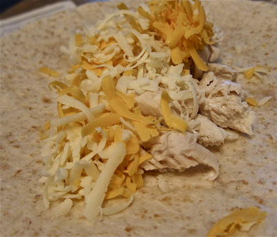 These are the most delicious chicken enchiladas. Since they're so easy to make, this recipe makes for a quick homemade dinner option that everyone will love. #WomenLivingWell #mexican #easyrecipes #dinner
