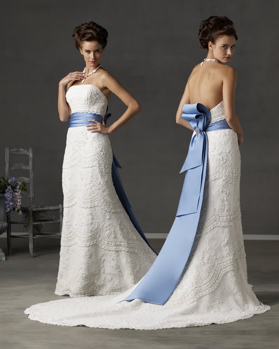 Wedding Gown: White wedding dress decorated with blue ribbons to make