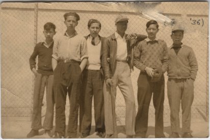 My dad, holding the stick, in 1936