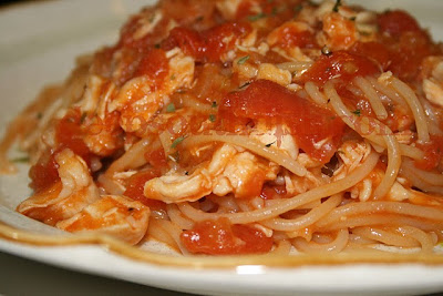 A fresh homemade tomato sauce and a whole cooked hen make for one of my favorite spaghetti dishes in memory of my grandma.