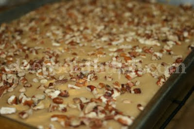 Yellow cake mix gets a boost of banana, brown sugar and cinnamon, and is topped with a quick caramel icing and chopped pecans.