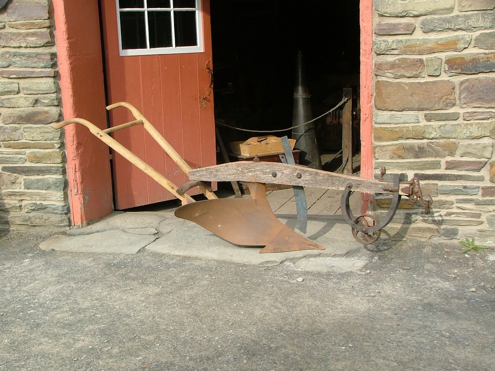 Rural Blacksmith Finishing the 1830's horsedrawn plow