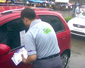 [Employees+of+Apollo+Tyres+handing+out+disaster+management+information+brochure+to+motorists+near+Lotus+Petrol+Pump+in+Andheri+West,+Mumbai.JPG]