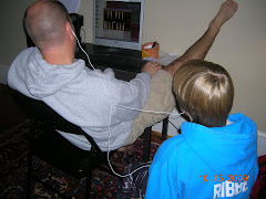 Jacob sharing his newly downloaded tunes with his dad!