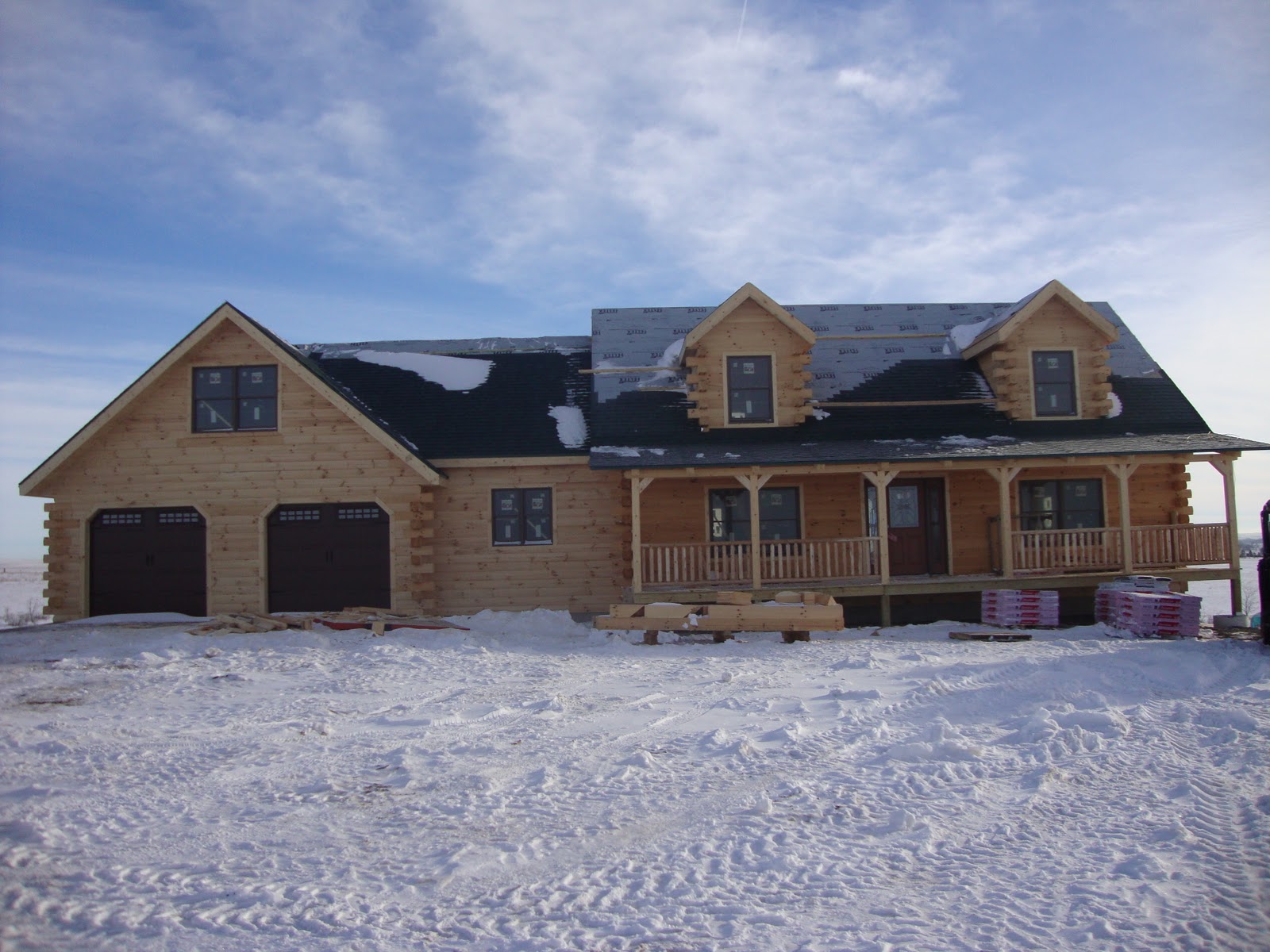 PATRIOT LOG HOME BUILDERS Mc Kay Hochsetler log home with garage and