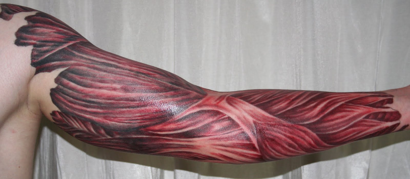 arm_with_muscle_tissue5_Tattoo_by_2Face_