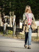 girl walking on the road.