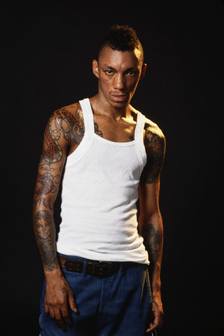 tattoo sleeve ideas for black men. Scary black man with dragon tattoo from sleeve to shoulder.