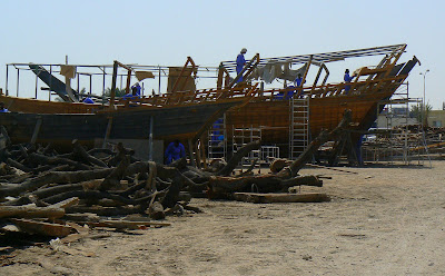 Men working on dhows