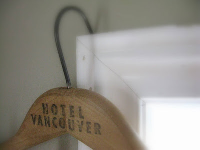 Learn how to create 10 minute dreamy white sheet curtains hung from a vintage hanger. Charming, beautiful and easy!