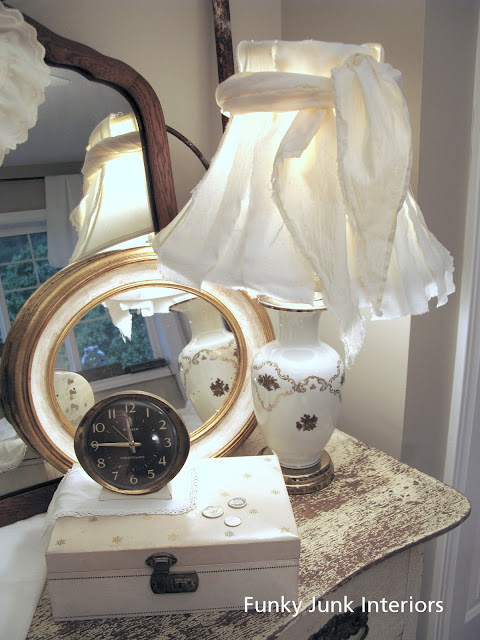 ripped white lampshade / White Trash Bedroom reveal with old door and gate headboard, via FunkyJunkInteriors.net