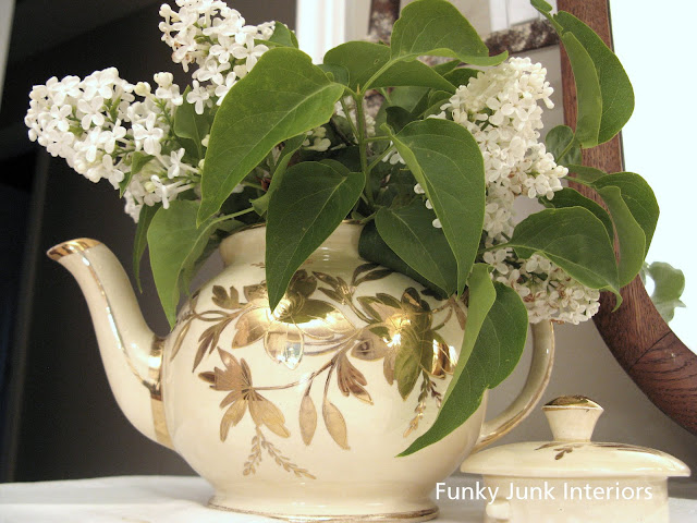 antique teapot for flowers / White Trash Bedroom reveal with old door and gate headboard, via FunkyJunkInteriors.net