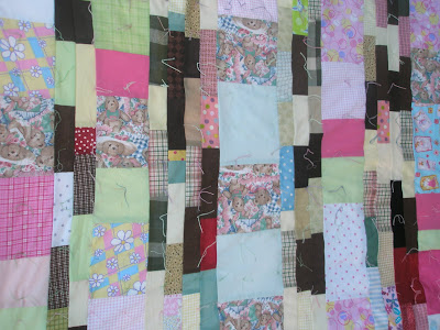 Humanitarian scrappy strip quilt twin size
