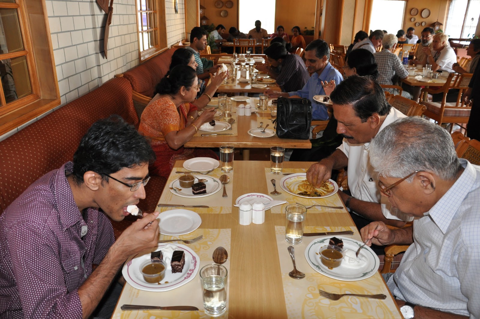 111 Have the buffet lunch (kerala style) at the Abad Plaza hotel, M.G
