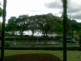 Kuching Waterfront view of the Kuching Waterfront with shady trees and Sg. Sarawak (Sarawak River) from the Hilton one rainy day