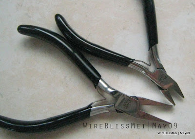 Flat nose pliers and a straight full flash side cutter.