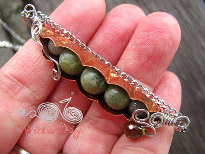 holding the wire wrapped Peas in a Pod using copper sheet and gemstones