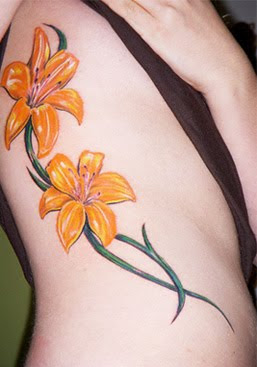side lower tiger lily tattoo 