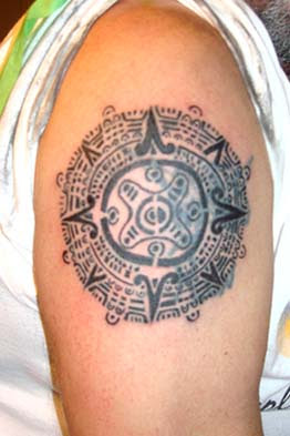 aztec tattoo sign on arms