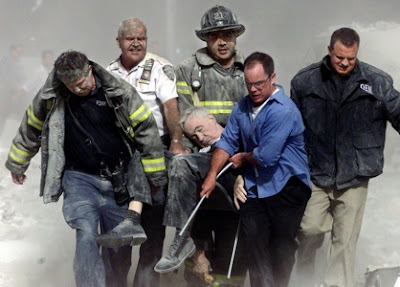 Father Judge's body being rescued from the wreckage by his firemen colleagues - Picture by Shannon Stapleton